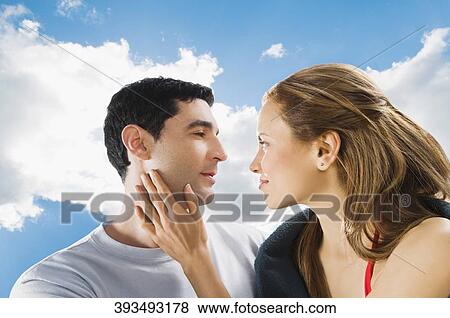 Mid adult couple romancing View Large Photo Image Stock Photo - Mid adult couple romancing. Fotosearch