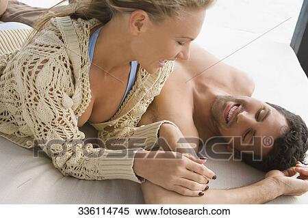 Mid adult couple romancing View Large Photo Image Stock Photography - Mid adult couple romancing. Fotosearch