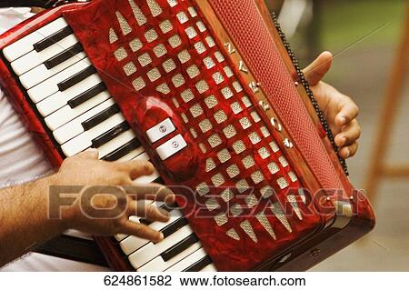 Mid section view of a man playing accordion, Via Padre Reginaldo Giuliani, Sorrento, Sorrentine Peninsula, Naples Province, Campania, Italy View Large Photo Image Stock Image - Mid section view of a man playing accordion, Via Padre Reginaldo Giuliani, Sorrento, Sorrentine Peninsula, Naples Province, Campania, Italy. Fotosearch