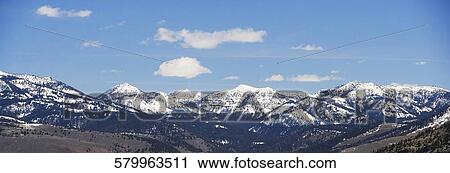 Mountains covered with snow, Yellowstone National Park, Wyoming, USA View Large Photo Image Stock Image - Mountains covered with snow, Yellowstone National Park, Wyoming, USA. Fotosearch