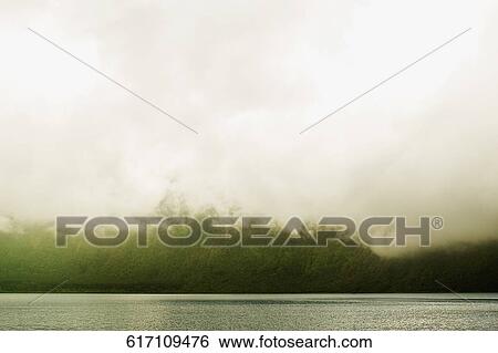Overcast sky over the sea, Singapore View Large Photo Image Stock Photograph - Overcast sky over the sea, Singapore. Fotosearch