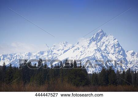 Panoramic view of snow covered mountains, Grand Teton National Park, Wyoming, USA View Large Photo Image Stock Photo - Panoramic view of snow covered mountains, Grand Teton National Park, Wyoming, USA. Fotosearch