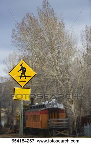 Stock Photo - Pedestrian Crossing sign on a pole, Ghost Town, Nevada City, Montana, USA. Fotosearch