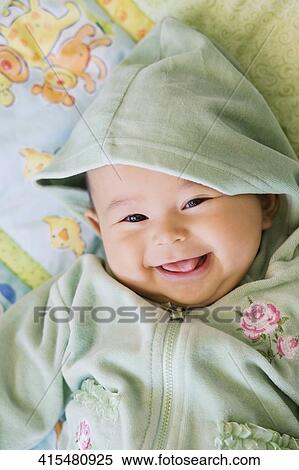 Portrait of a baby girl smiling View Large Photo Image Stock Photography - Portrait of a baby girl smiling. Fotosearch