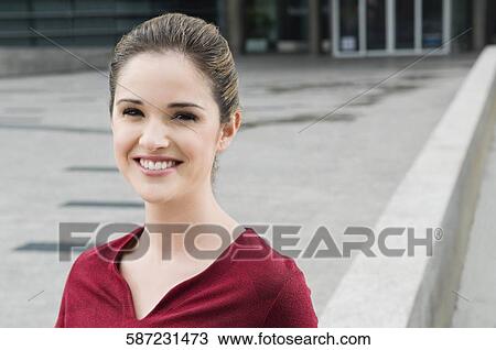 Portrait of a businesswoman smiling View Large Photo Image Stock Image - Portrait of a businesswoman smiling. Fotosearch