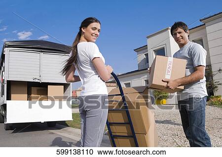 Portrait of a couple moving View Large Photo Image Stock Image - Portrait of a couple moving. Fotosearch