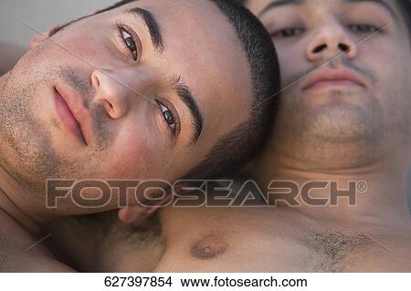 Portrait of a gay couple romancing View Large Photo Image Picture - Portrait of a gay couple romancing. Fotosearch