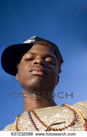 Stock Photo - Portrait of a gay man. Fotosearch