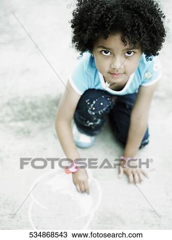 Portrait of a girl drawing with chalk on the floor View Large Photo Image Stock Image - Portrait of a girl drawing with chalk on the floor. Fotosearch