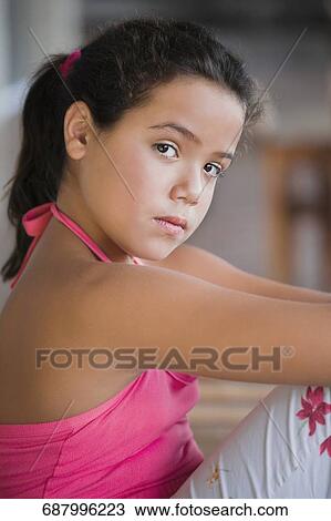 Portrait of a girl sitting View Large Photo Image Stock Image - Portrait of a girl sitting. Fotosearch