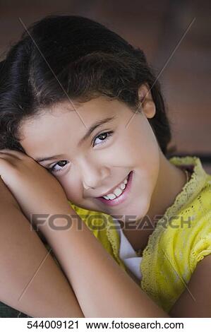 Portrait of a girl smiling View Large Photo Image Stock Image - Portrait of a girl smiling. Fotosearch