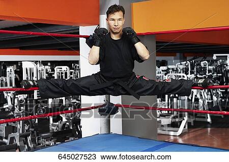 Portrait of a male boxer exercising View Large Photo Image Stock Image - Portrait of a male boxer exercising. Fotosearch
