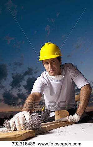 Portrait of a male carpenter View Large Photo Image Stock Photograph - Portrait of a male carpenter. Fotosearch