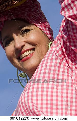 Stock Image - Portrait of a mature woman smiling. Fotosearch