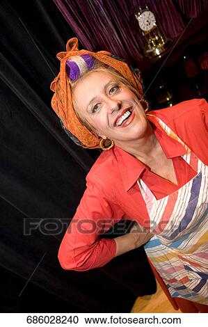 Stock Image - Portrait of a mature woman smiling. Fotosearch