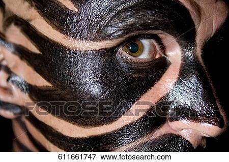 Portrait of a mid adult man with face paint View Large Photo Image Stock Photo - Portrait of a mid adult man with face paint. Fotosearch