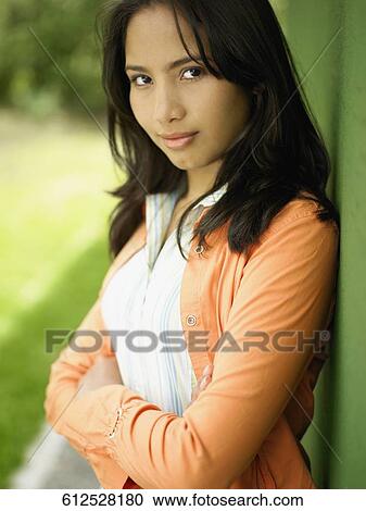 Stock Image - Portrait of a teenage girl smiling. Fotosearch