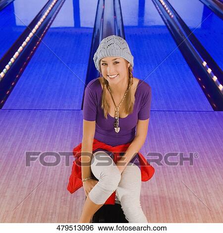 Portrait of a teenage girl smiling View Large Photo Image Stock Photograph - Portrait of a teenage girl smiling. Fotosearch