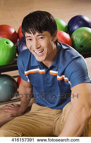 Portrait of a young man smiling View Large Photo Image Stock Image - Portrait of a young man smiling. Fotosearch