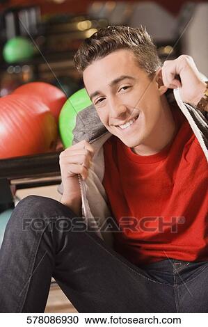 Portrait of a young man smiling View Large Photo Image Stock Image - Portrait of a young man smiling. Fotosearch