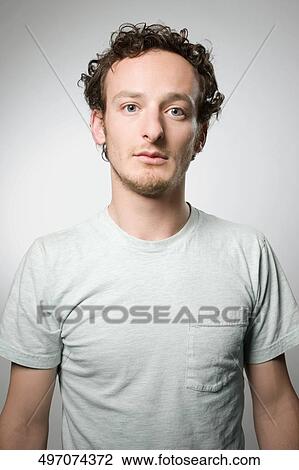 Stock Image - Portrait of a young man. Fotosearch