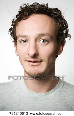 Stock Image - Portrait of a young man. Fotosearch