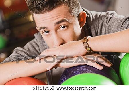 Portrait of a young man thinking View Large Photo Image Stock Photo - Portrait of a young man thinking. Fotosearch