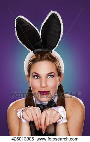 Portrait of a young woman in rabbit costume View Large Photo Image Stock Photography - Portrait of a young woman in rabbit costume. Fotosearch