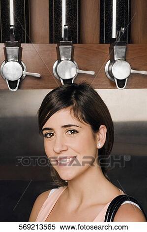 Portrait of a young woman smiling View Large Photo Image Stock Photography - Portrait of a young woman smiling. Fotosearch