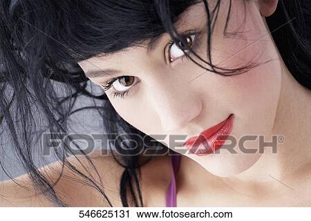 Portrait of a young woman View Large Photo Image Stock Image - Portrait of a young woman. Fotosearch