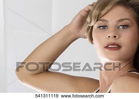 Portrait of a young woman View Large Photo Image Stock Photo - Portrait of a young woman. Fotosearch