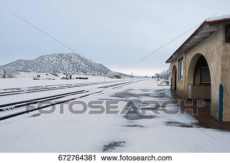 Railroad tracks covered with snow View Large Photo Image Stock Image - Railroad tracks covered with snow. Fotosearch