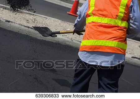 Rear view of a construction worker at a road construction site, Biscayne Boulevard, Miami, Florida, USA View Large Photo Image Stock Image - Rear view of a construction worker at a road construction site, Biscayne Boulevard, Miami, Florida, USA. Fotosearch