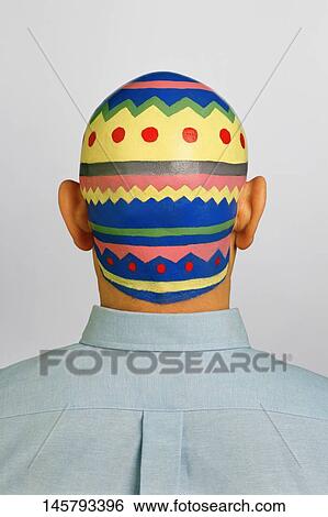 Rear view of a man with his painted head View Large Photo Image Stock Photograph - Rear view of a man with his painted head. Fotosearch
