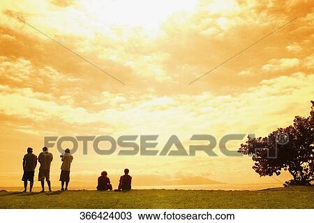 Rear view of five people on the beach, Tahiti, French Polynesia View Large Photo Image Stock Image - Rear view of five people on the beach, Tahiti, French Polynesia. Fotosearch
