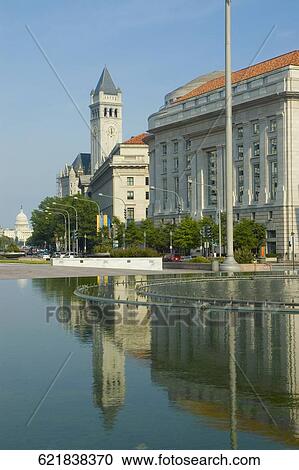 Reflection of a building in water, Old Post Office Building, Pennsylvania Avenue, Washington DC, USA View Large Photo Image Stock Image - Reflection of a building in water, Old Post Office Building, Pennsylvania Avenue, Washington DC, USA. Fotosearch