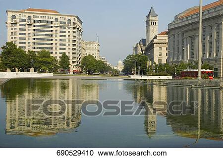 Reflection of buildings in water, Old Post Office Building, Pennsylvania Avenue, Washington DC, USA View Large Photo Image Stock Image - Reflection of buildings in water, Old Post Office Building, Pennsylvania Avenue, Washington DC, USA. Fotosearch