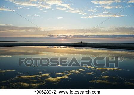 Reflection of clouds in water View Large Photo Image Stock Image - Reflection of clouds in water. Fotosearch