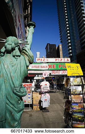 Replica of the Statue of Liberty in a street market, Fifth Avenue, Manhattan, New York City, New York State, USA View Large Photo Image Stock Image - Replica of the Statue of Liberty in a street market, Fifth Avenue, Manhattan, New York City, New York State, USA. Fotosearch