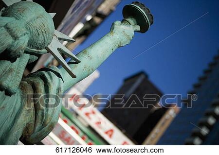 Replica of the Statue of Liberty in a street market, Fifth Avenue, Manhattan, New York City, New York State, USA View Large Photo Image Stock Photograph - Replica of the Statue of Liberty in a street market, Fifth Avenue, Manhattan, New York City, New York State, USA. Fotosearch