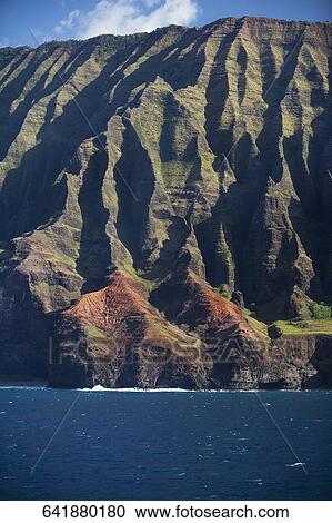 Rock formations at the water's edge, Na Pali Coast State Park, Kauai, Hawaii Islands, USA View Large Photo Image Stock Image - Rock formations at the water's edge, Na Pali Coast State Park, Kauai, Hawaii Islands, USA. Fotosearch