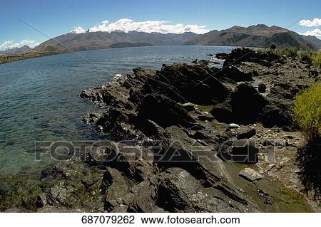 Stock Image - Rock formations on the coast, New Zealand. Fotosearch