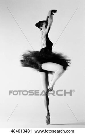 Side profile of a female ballet dancer dancing View Large Photo Image Stock Image - Side profile of a female ballet dancer dancing. Fotosearch