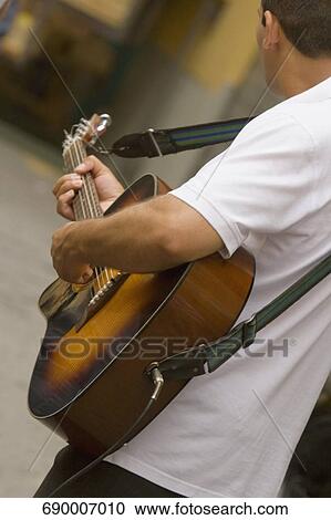 Side profile of a man playing guitar, Via Padre Reginaldo Giuliani, Sorrento, Sorrentine Peninsula, Naples Province, Campania, Italy View Large Photo Image Stock Image - Side profile of a man playing guitar, Via Padre Reginaldo Giuliani, Sorrento, Sorrentine Peninsula, Naples Province, Campania, Italy. Fotosearch