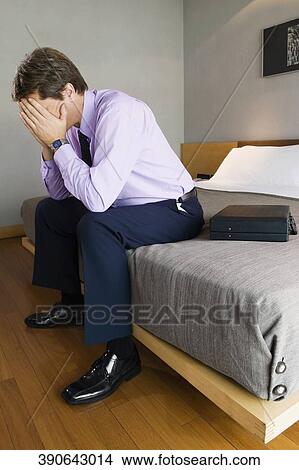 Side profile of a mature man hiding his face View Large Photo Image Picture - Side profile of a mature man hiding his face. Fotosearch