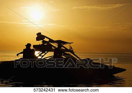 Silhouette of a boat in the sea, Florida Keys, Florida, USA View Large Photo Image Stock Image - Silhouette of a boat in the sea, Florida Keys, Florida, USA. Fotosearch