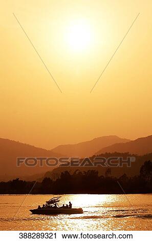 Silhouette of a group of a people in the boat, Chiang Rai, Amphoe Mueang, Chiang Rai Province, Thailand View Large Photo Image Stock Image - Silhouette of a group of a people in the boat, Chiang Rai, Amphoe Mueang, Chiang Rai Province, Thailand. Fotosearch
