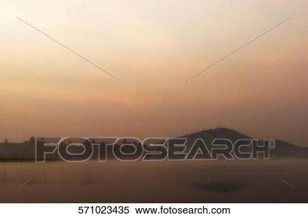 Silhouette of a mountain at dusk, Chiang Rai, Amphoe Mueang, Chiang Rai Province, Thailand View Large Photo Image Stock Photography - Silhouette of a mountain at dusk, Chiang Rai, Amphoe Mueang, Chiang Rai Province, Thailand. Fotosearch