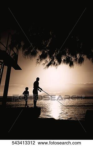Silhouette of a person fishing in a lake, Lake Mead, Utah, USA View Large Photo Image Stock Image - Silhouette of a person fishing in a lake, Lake Mead, Utah, USA. Fotosearch