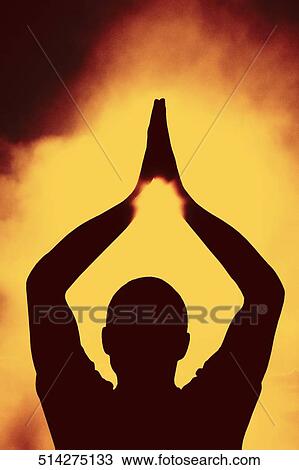 Silhouette of a person practicing yoga View Large Photo Image Stock Image - Silhouette of a person practicing yoga. Fotosearch